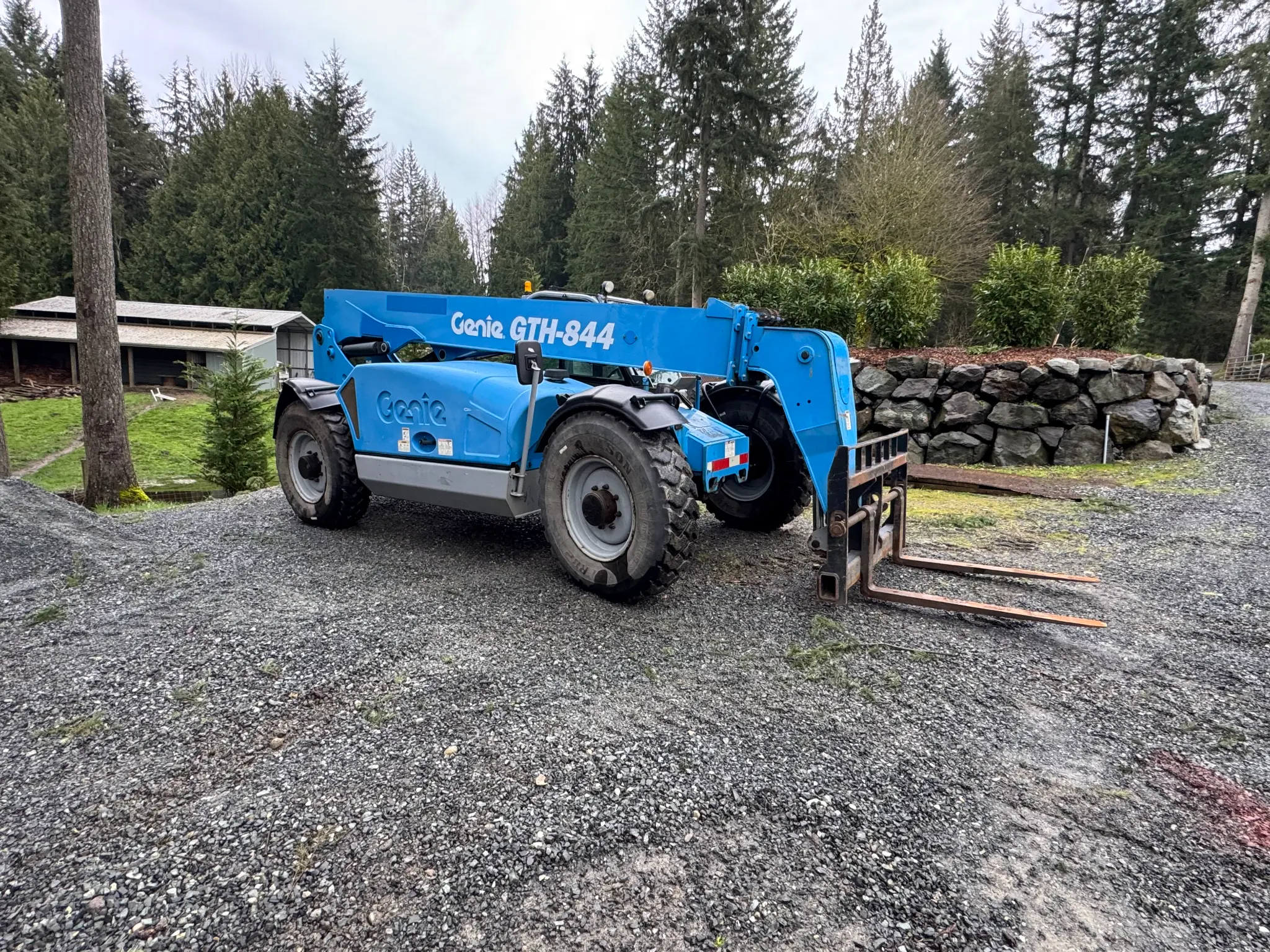 Pilchuck Construction Genie telehandler on gravel jobsite in Western Washington