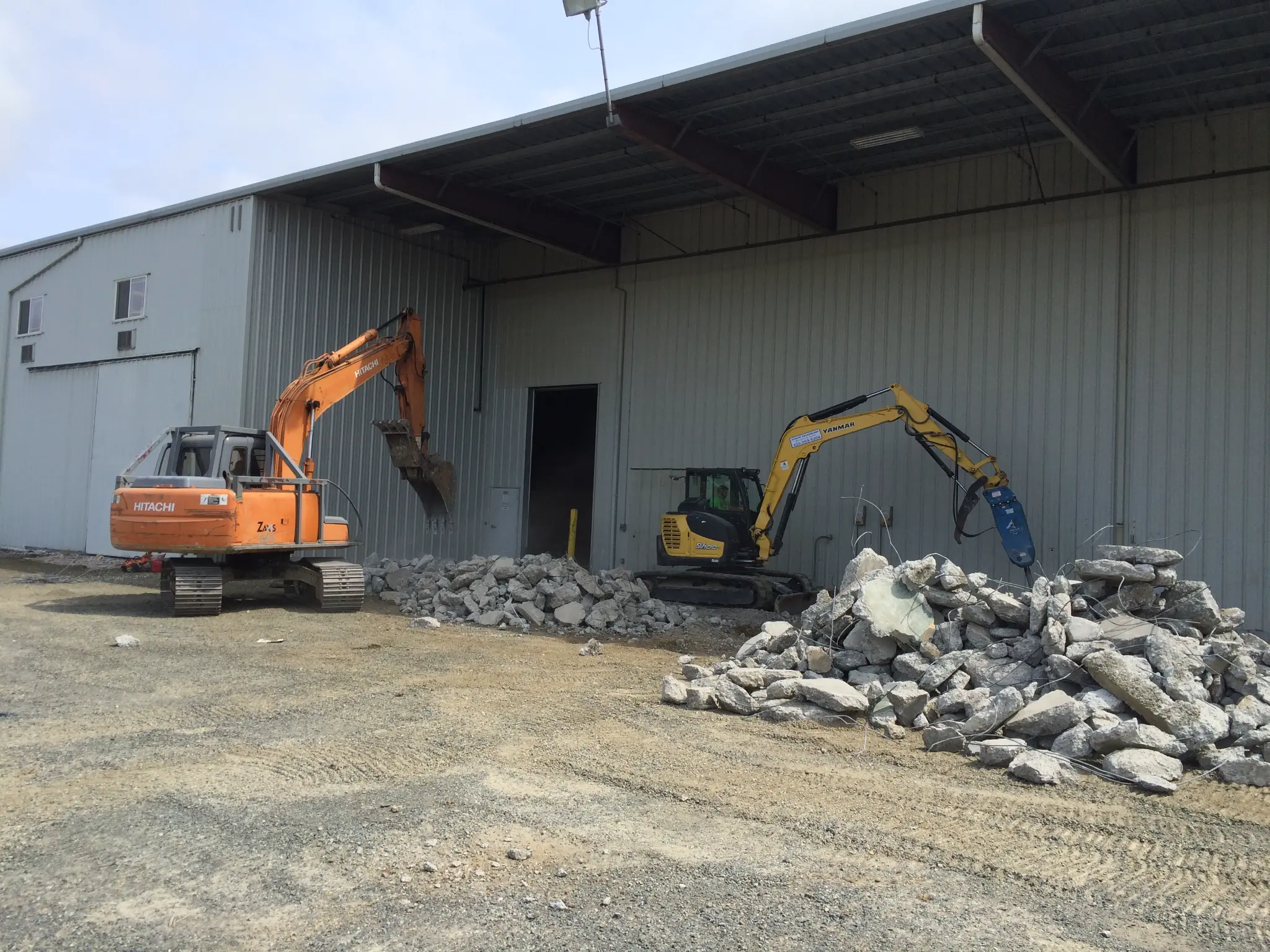 Pilchuck Construction excavators performing site work and land clearing in Western Washington