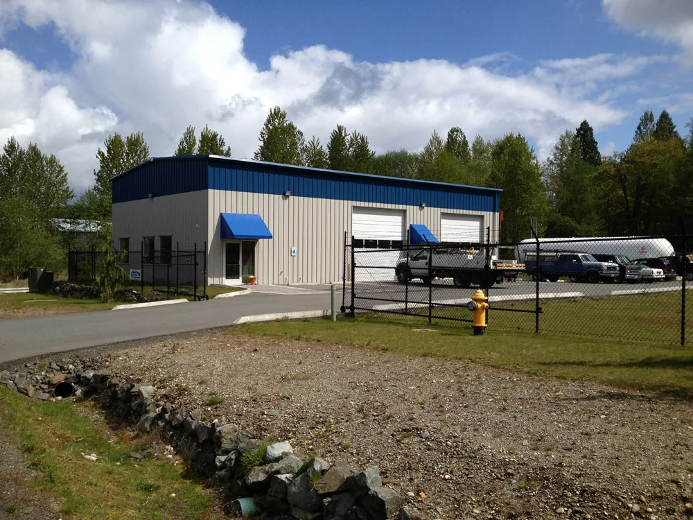 Commercial warehouse interior with steel structure and lighting